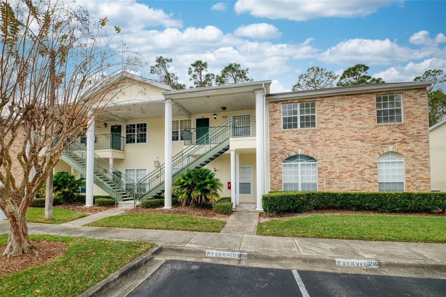 Welcome to this beautifully maintained two-bedroom, two-bathroom second-floor end-unit condominium offering 960 square feet of well-designed living space with close proximity to the University of Central Florida main campus. From the moment you enter, vaulted ceilings and abundant natural light create an open and inviting atmosphere. The open-concept living room, dining room, and kitchen combination provides a functional and comfortable layout ideal for both everyday living and entertaining. Tile flooring throughout, ceiling fans, blinds on all windows, and French doors leading to the lanai add both style and practicality to the interior. The kitchen blends classic style with everyday convenience, featuring white cabinetry, a pantry closet, a cozy breakfast nook, and white appliances. A functional layout connects seamlessly to the surrounding living spaces, making it ideal for casual dining, entertaining, or daily living. The adjacent laundry closet includes a stackable washer and dryer, adding to the home’s overall convenience. The primary suite serves as a private retreat, complete with a walk-in closet, ceiling fan, and an en-suite bathroom offering ample counter space and a tub/shower combination. The second bedroom, split from the primary bedroom, is well-sized and versatile, perfect for guests, a home office, or additional living needs, with easy access to the second full bathroom. Outdoor living is enhanced by a screened-in rear lanai overlooking a peaceful wooded area, providing a quiet and relaxing setting to enjoy your morning coffee or unwind in the evenings. An exterior storage/utility closet offers additional space for storage, and the unit includes one reserved parking spot. The community offers low monthly HOA fees and an exceptional location—walk or bike to UCF’s main campus, just minutes from a wide variety of restaurants and shopping, and only 10 minutes to SR 408 for easy access throughout Central Florida. This home offers the perfect blend of comfort, convenience, and location—ideal for homeowners, students, or investors alike.