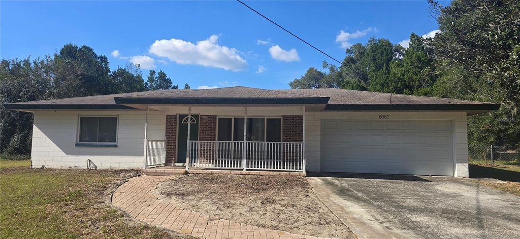 Photo of 5067 Mockingbird Drive, Dade City, FL 33523 (MLS # W7880968)