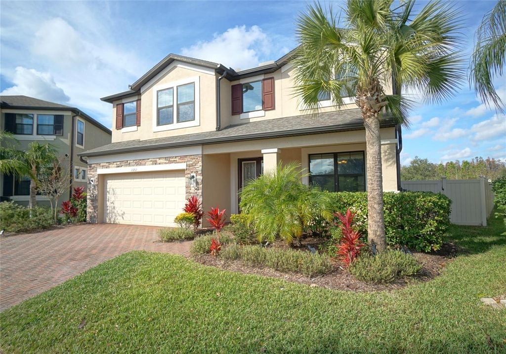 Photo of 10702 Pleasant Knoll Drive, Tampa, FL 33647 (MLS # TB8426844)