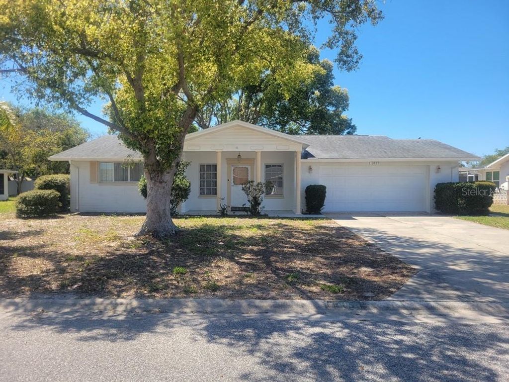 Photo of 10329 Castalie Drive, Port Richey, FL 34668 (MLS # W7884188)