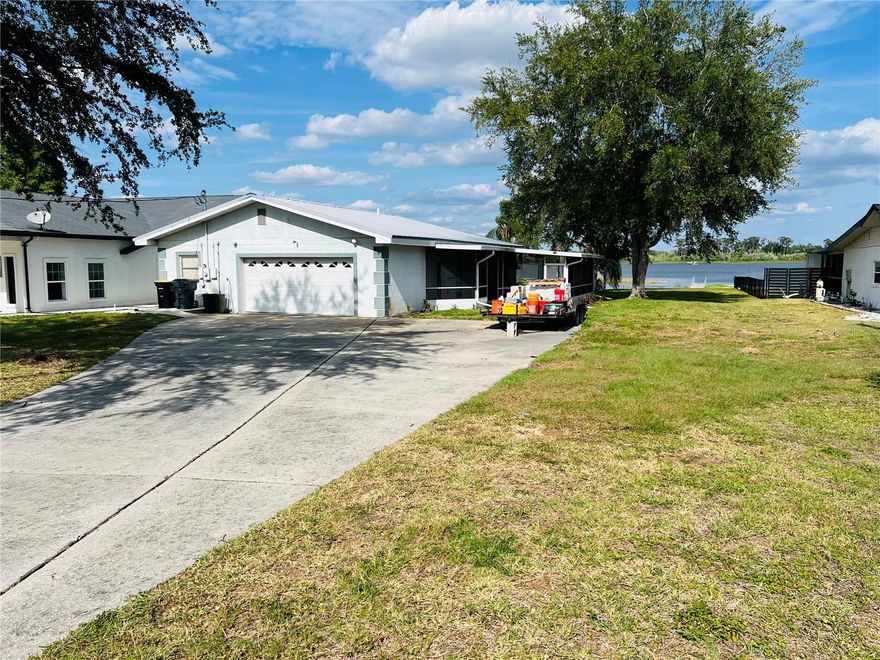 Sitting on Lake Jessie and on a beautiful lot along the Winter Haven Chain of Lakes, this property offers an incredible opportunity to own waterfront living at an affordable price point. Known as the “Chain of Lakes City,” Winter Haven features dozens of interconnected lakes perfect for boating, fishing, watersports, and enjoying the true Florida lifestyle.
Whether you’re looking for a full-time residence, seasonal snowbird retreat, or a smart long-term investment opportunity, this home is priced right for someone ready to make a few updates while securing a spot on the highly desirable main Chain of Lakes. Opportunities like this are becoming harder and harder to find.
The home includes a metal roof, updated AC system, and updated plumbing, giving you a solid foundation to make it your own. The oversized lot provides plenty of extra driveway space and room to add a large garage or additional storage for boats, trailers, or recreational vehicles.
Relax and unwind in the screened-in area while enjoying the peaceful lake breeze and beautiful waterfront surroundings. With endless potential and a low price, this property is a rare chance to create your dream lakefront getaway without breaking the bank.