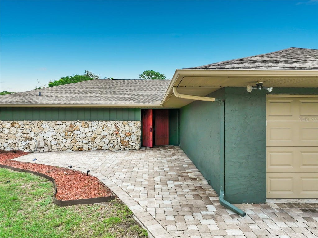 Photo of 6193 Valerian Boulevard, Orlando, FL 32819 (MLS # O6420241)