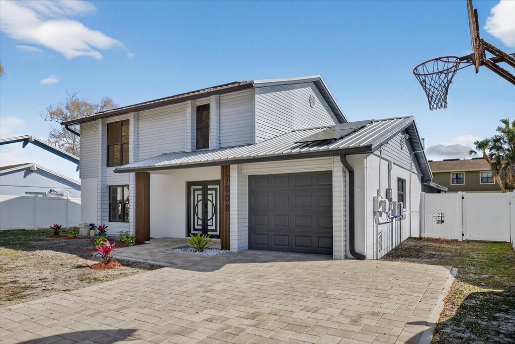 Photo of 7608 Palmbrook Drive, Tampa, FL 33615 (MLS # TB8483650)