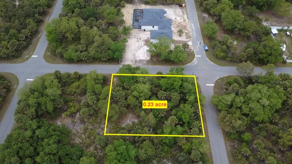 Photo of 18125 Garth Avenue, Port Charlotte, FL 33948 (MLS # O6402541)