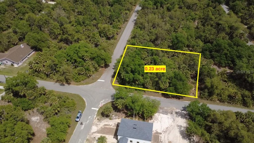 Photo of 18125 Garth Avenue, Port Charlotte, FL 33948 (MLS # O6402541)