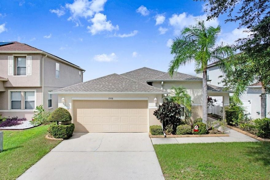 Immaculately maintained 3BR/2BA home in the highly desirable Boyette Creek community! Zoned for top-rated Riverview schools, this 2004-built gem offers 1,716 sq ft of open living space with a bright kitchen overlooking the great room. Enjoy peaceful mornings on the screened patio with serene pond views. The primary living areas feature high ceilings and crown molding. To the left are the bedrooms and baths. The guest bath has been renovated to include a walk-in shower and is conveniently located near the secondary bedrooms. Just down the hall is the primary bedroom with en-suite bath and walk-in closet. A well-appointed kitchen with stone counters and 42" upper cabinets along with SS appliances make cooking a breeze. Through the kitchen is access to the extended screened lanai with views of the pond. Fruit trees including mango, sugar apple, jackfruit, papaya, and loquat make for quick access to snacks. Pride of ownership shows throughout with a newer roof (approx 2021), well maintained gutters, immaculately clean interiors, and a quiet location. The AC was replaced in 2022 and the washer and dryer convey with the property. No CDD, low HOA, and close to shopping, dining, and I-75—this home is truly move-in ready!