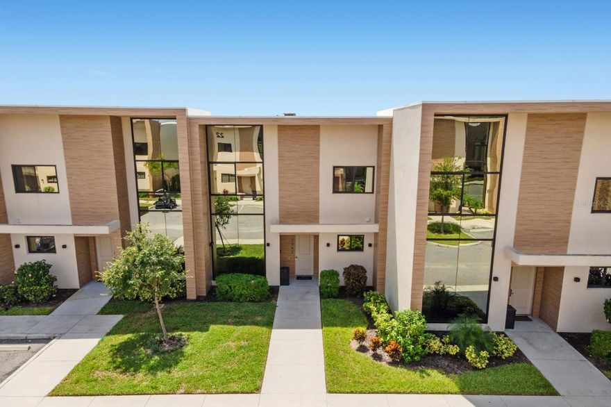 Modern Resort Living Just Minutes from Disney | Turn-Key Investment Opportunity

Welcome to 3092 Rockefeller Way, a contemporary, fully furnished residence located in one of Kissimmee’s most desirable resort-style communities, just minutes from Walt Disney World®, dining, shopping, and world-class entertainment. Designed with both comfort and income potential in mind, this home is ideal as a vacation retreat, second home, or high-performing short-term rental.

Step inside to a bright, open-concept layout where modern design meets thoughtful functionality. The chef’s kitchen anchors the main living space and features sleek flat-panel cabinetry, stainless steel appliances, a statement range hood, oversized waterfall island with counter-height seating, and warm wood-look tile flooring that flows seamlessly throughout the main areas—perfect for hosting and entertaining.

The living area impresses with soaring ceilings, designer pendant lighting, and a striking feature wall with modern fireplace, creating a welcoming yet elevated atmosphere. Large sliding glass doors and expansive windows flood the home with natural light and provide effortless indoor-outdoor flow.

Multiple private bedroom suites offer comfort and flexibility for guests and owners alike. Spa-inspired bathrooms showcase floating vanities, stone countertops, frameless glass shower enclosures, and designer tile work. The primary suite offers a tranquil retreat with generous proportions, plush carpeting, and serene views. Secondary bedrooms are thoughtfully styled and ideal for family or guests.

Additional highlights include:

Inside laundry room with full-size washer & dryer

Contemporary finishes and curated furnishings throughout

Neutral designer palette for broad guest appeal

Energy-efficient construction and modern systems

Community & Location Benefits:
Situated in a gated, resort-style community, owners and guests enjoy access to luxury amenities, including a clubhouse, resort pool, fitness facilities, concierge services, and beautifully maintained grounds. The location offers unbeatable convenience with quick access to Disney parks, Universal, SeaWorld, Orlando International Airport, championship golf courses, and major highways.

Investment Advantage:
Zoned for short-term rentals, this property is perfectly positioned for investors seeking strong rental demand, flexibility of use, and minimal maintenance—while also serving as a stylish personal getaway in the heart of Central Florida.

Whether you’re looking to expand your investment portfolio or secure a vacation home that pays for itself, 3092 Rockefeller Way delivers lifestyle, location, and income potential in one exceptional package.