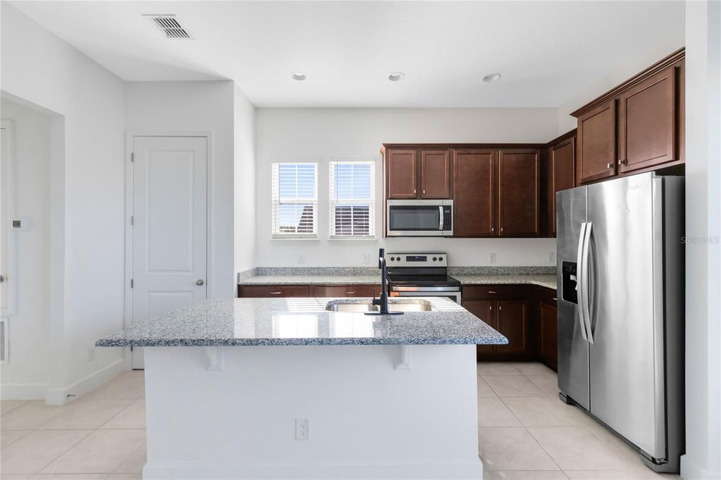 Photo of 8966 Lower Carrel Circle, Orlando, FL 32827 (MLS # O6396554)