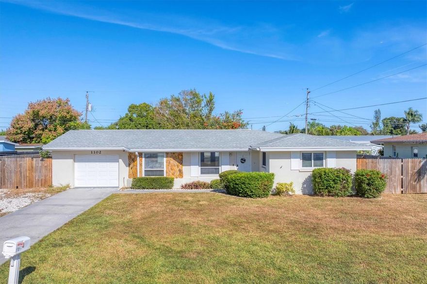 Welcome to 1102 Fruitland Ave in Bradenton — a light, bright, and beautifully maintained home offering comfort, updates, and an exceptional location. This 2-bed, 2-bath residence features a new roof and electrical panel (2022), giving you peace of mind from day one. Inside, natural light fills the home, highlighted by an air-conditioned Florida room that provides valuable extra living space—perfect as a lounge, fitness area, office, or hobby room.

The kitchen is warm and inviting with cherry cabinetry, Corian countertops, and a cozy eat-in area. Double-pane windows, mature landscaping, and lovely curb appeal make this home feel welcoming from the moment you arrive. Step outside to a huge fenced-in backyard—ideal for pets, gardening, or entertaining—along with a spacious covered patio designed for enjoying Florida’s laid-back lifestyle.

With optional, extremely low HOA fees, this property offers flexibility and affordability. All of this, plus a prime location just minutes from shopping, dining, Downtown Bradenton, the world-famous IMG Academy, SRQ Airport, and our beautiful Gulf Coast beaches.

A fantastic opportunity for full-time residents, seasonal owners, or investors looking for convenience and value in the heart of Bradenton.