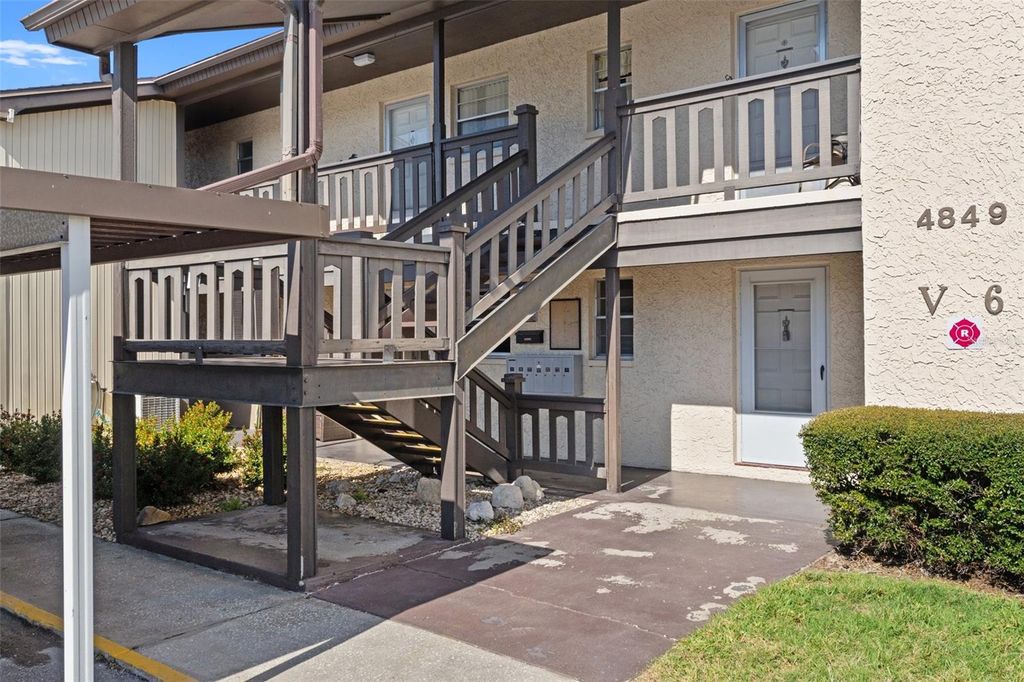 Photo of 4849 Onyx Lane #106, New Port Richey, FL 34652 (MLS # W7864640)