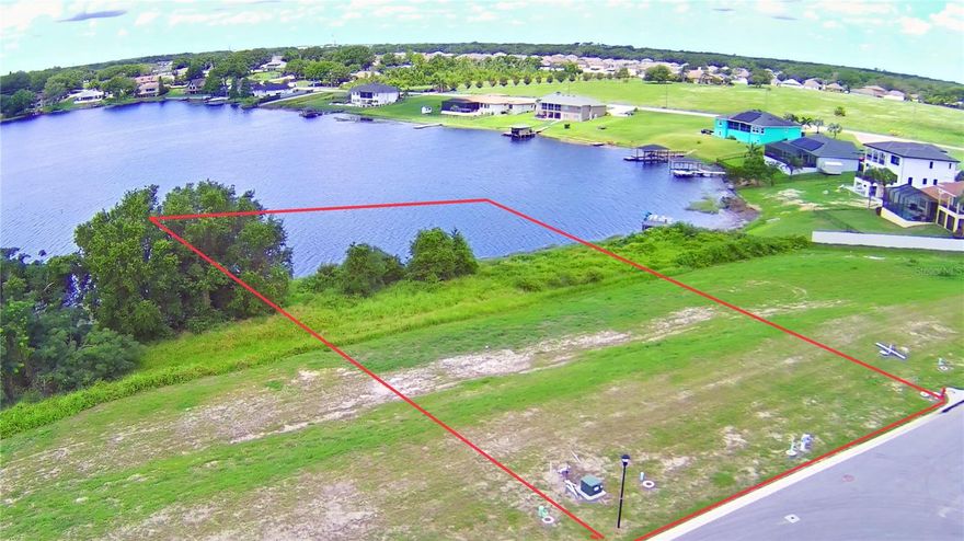 Incredible opportunity to own this buildable lakefront lot in gated Lake Juliana Estates! This lot is cleared and ready for you to build your dream home in this community nestled between Lake Juliana and Tennessee Lake with clubhouse/community pool, tennis, basketball, playground, fitness center and dock on Lake Juliana. Don't miss out on your chance to have this lakefront lot to build your dream home on!