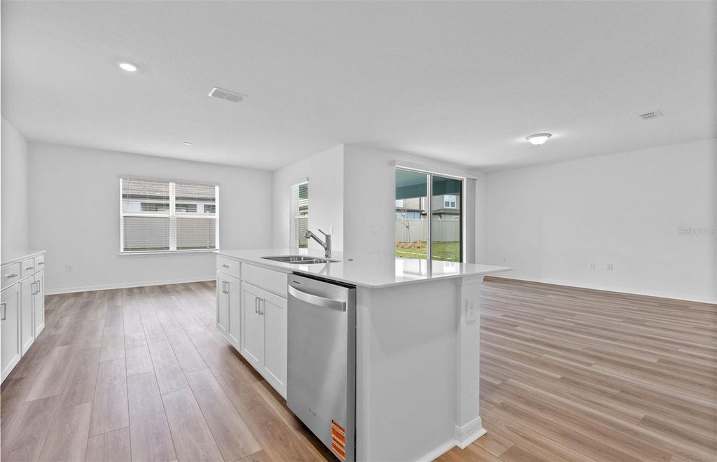 Photo of 1082 Silverlake Boulevard, Lake Alfred, FL 33850 (MLS # TB8462053)