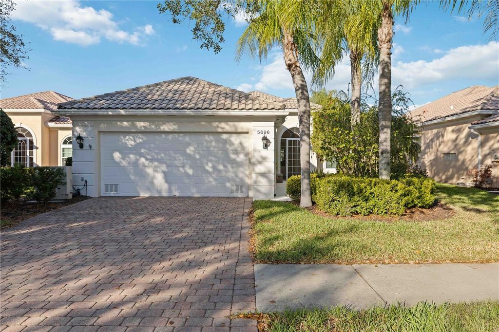 Photo of 5696 Ferrara Drive, Sarasota, FL 34238 (MLS # A4686855)