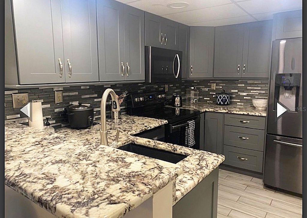 Photo of 3006 Caring Way #301, Port Charlotte, FL 33952 (MLS # C7522196)