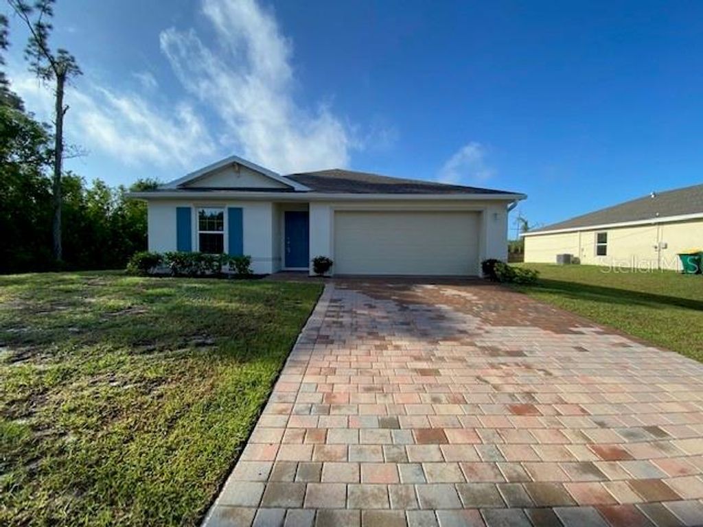 Photo of 23211 Mcqueeney Avenue, Port Charlotte, FL 33980 (MLS # D6146995)