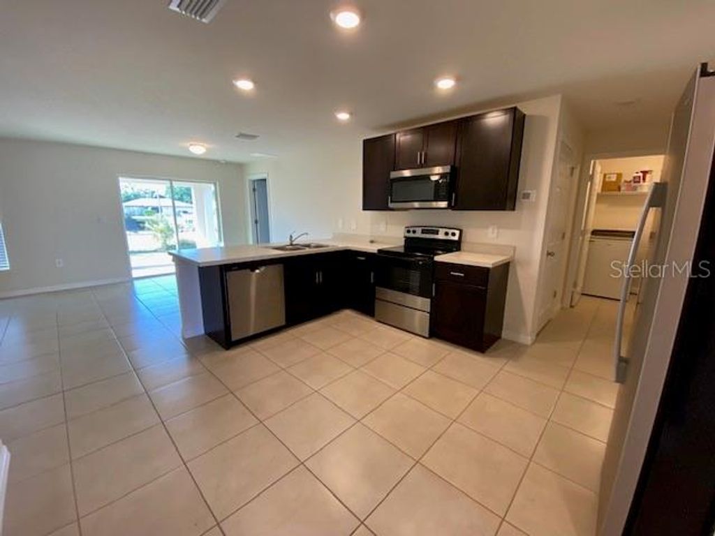 Photo of 23211 Mcqueeney Avenue, Port Charlotte, FL 33980 (MLS # D6146995)