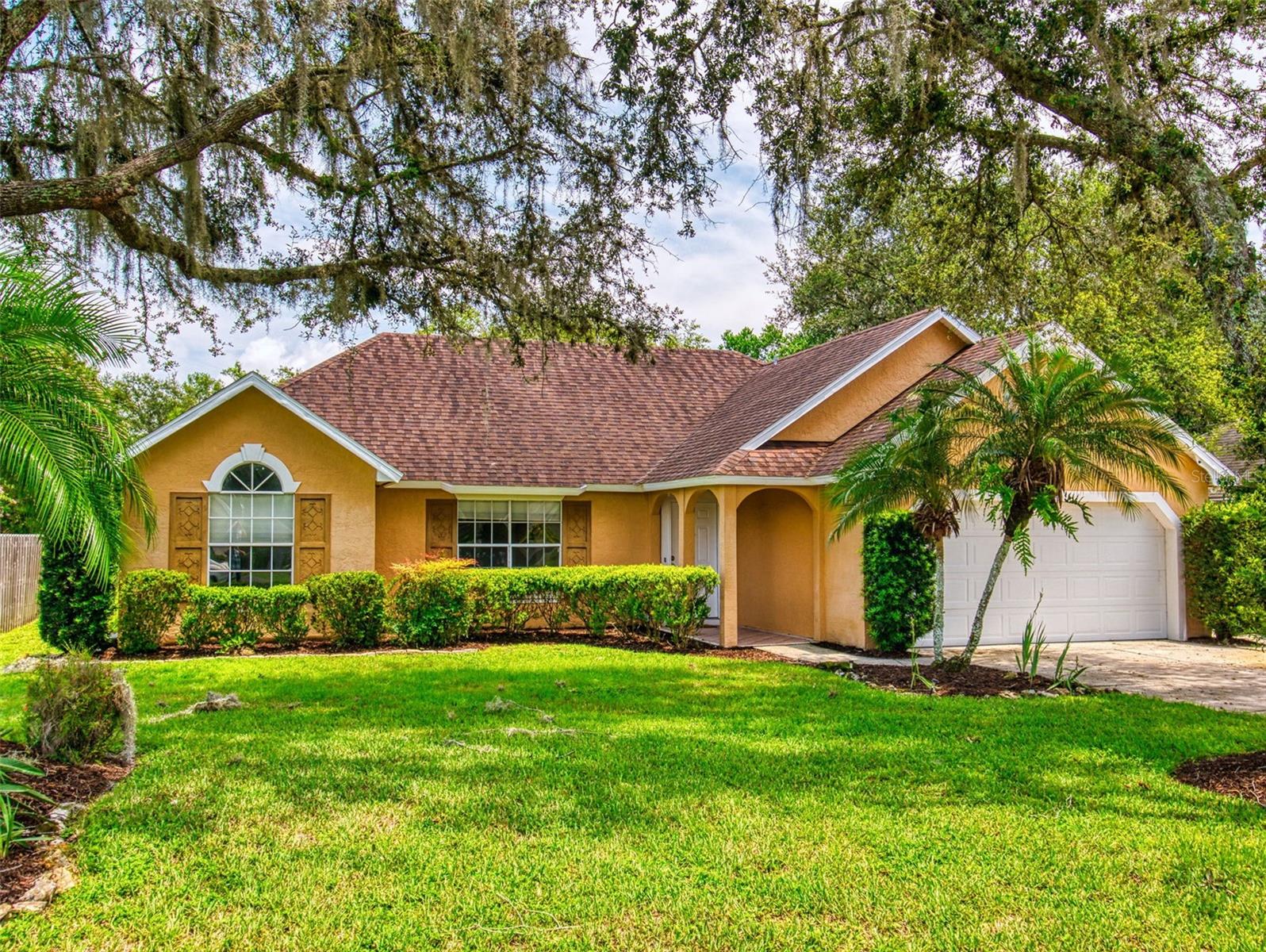 3 Bedroom / 2 Bath home located in beautiful DeLand. Enter this inviting home into the large living room with high ceilings and lots of natural light. The primary bedroom, with an ensuite bathroom, will be a welcomed retreat at the end of the day. The two guest rooms are light, bright and spacious. The guest bath is conveniently located between the two guest bedrooms. The kitchen is equipped with a newer refrigerator. Exit the kitchen onto your pavered patio. The perfect place to enjoy cooking out with family and friends in your backyard oasis. The 2-car garage and conveniently located indoor laundry room both provide additional storage options. A/C was new in 2024, Hot Water Heater new in 2025, new carpet and new interior paint! No HOA! The beautiful beaches of Volusia County are about a 35 minute drive away and the Orlando International Airport is about an hour drive. Enjoy all that is historic DeLand such as great restaurants, theater productions, museums and nearby access to beautiful parks and springs! Call today to schedule a private showing.