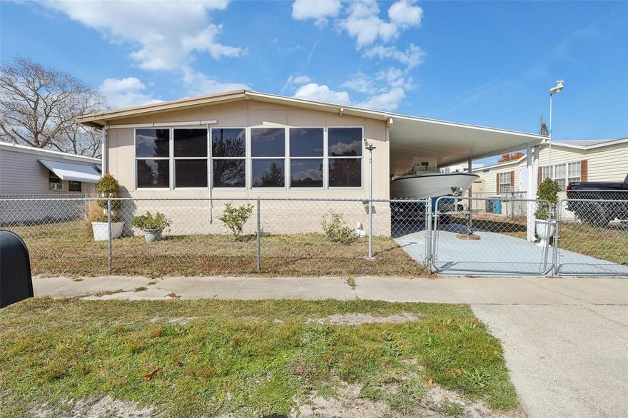 Forget the monthly dues and restrictive rules--here, you truly own your slice of the Florida dream. This sprawling 2-bedroom, 2-bath home sits on its own land with zero HOA fees, giving you total freedom just minutes from the Indian River and Melbourne's sandy beaches.

Inside, the fresh vinyl plank flooring create an airy, open vibe (and yes, it's completely carpet-free!). The kitchen is a bright standout with crisp white cabinetry and a built-in buffet that makes hosting weekend brunches a breeze.

Need space for hobbies? You've got two oversized utility rooms, a fully fenced yard, and a massive enclosed Florida room perfect for afternoon lounging. Whether you're headed to downtown Melbourne or commuting to Harris, everything is right at your fingertips.
