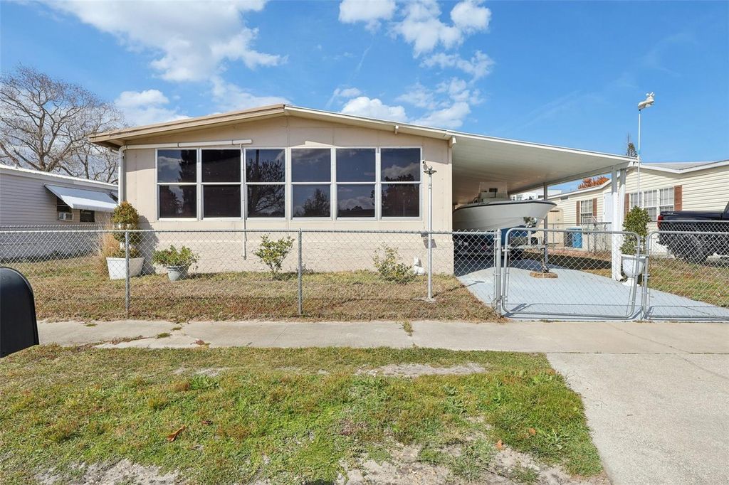 Photo of 2539 Chatham Way NE, Palm Bay, FL 32905 (MLS # TB8479948)