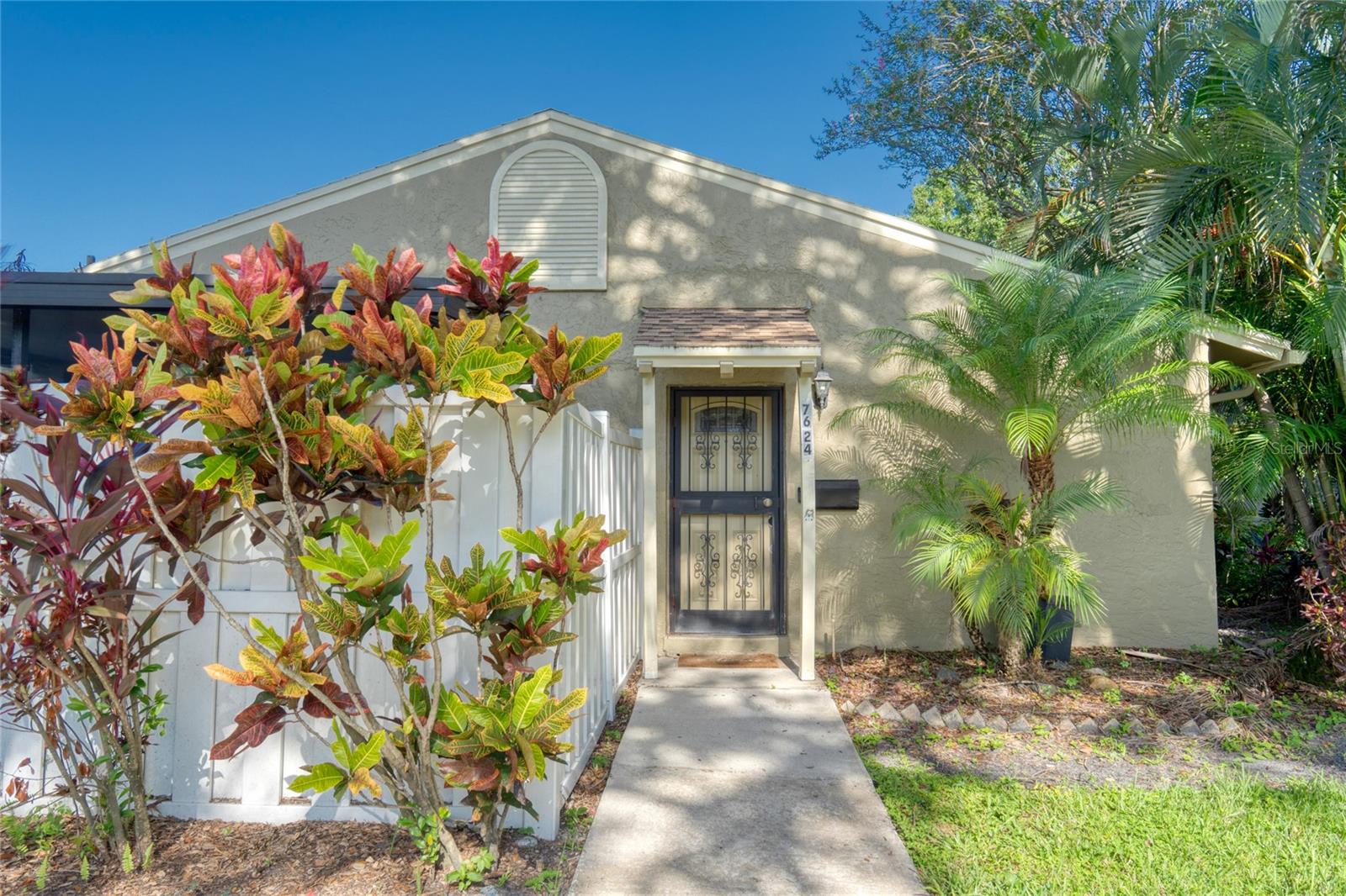 Charming, Updated Townhome in Prime Location – Affordable, Adorable, and Move-In Ready!
Why rent when you can own this beautifully maintained and delightfully updated 2-bedroom, 1-bathroom townhome with 2 covered parking spaces in a friendly, well-kept community with low HOA fees? Light, bright, and full of personality, this single-level unit is the perfect starter home, downsizer, or investment opportunity. Step inside to find laminate flooring in the bedrooms, an elegantly renovated bathroom with floor-to-ceiling tile, and custom closet organizers in both bedrooms to maximize storage. The kitchen features stainless steel appliances, crisp white cabinetry, a pantry, and a breakfast bar ideal for casual meals or entertaining. Enjoy your morning coffee or unwind in the evening on the covered and screened lanai—a private, serene outdoor space that feels like an extension of your living room. There’s also a grilling area, outdoor storage shed, and a charming side yard that leads to your dedicated carport. All of this with a low monthly HOA of just $245, which includes exterior maintenance, roof, landscaping, trash, and access to the community pool. Ideally located close to shopping, dining, parks, and more—this home offers incredible value in a fantastic neighborhood. Don't miss your chance to own this little gem—schedule your private tour today!