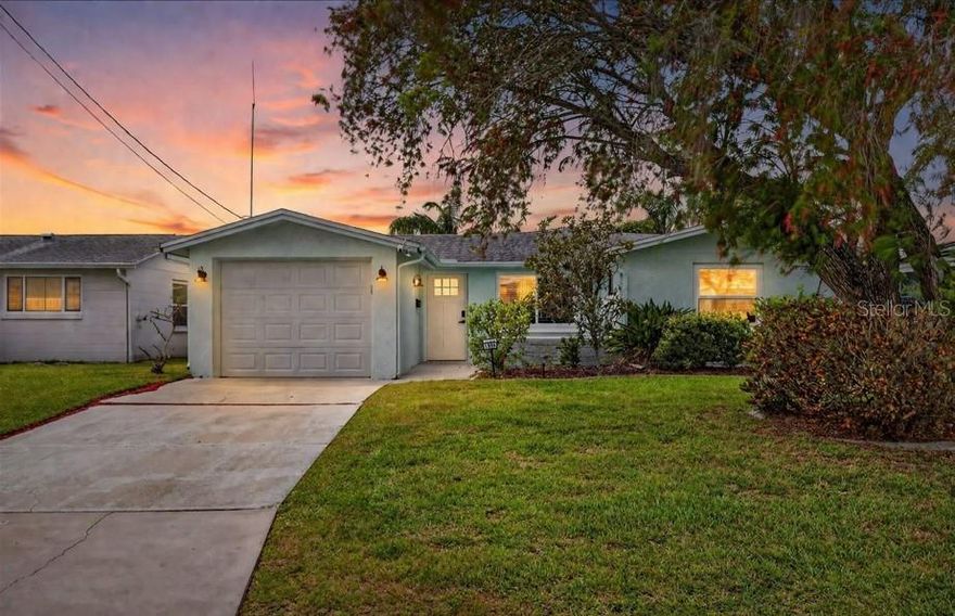 Imagine ending every day with a Gulf sunset in your backyard and your boat just steps away—welcome to Gulf Harbors living.

Experience true Florida waterfront living in this beautifully updated 3-bedroom, 2-bath home with direct deep-water access to the South Channel and the Gulf in sought-after Gulf Harbors. This open-concept layout is designed for both everyday living and entertaining, featuring plank-style tile flooring throughout and a bright, modern coastal feel.

The heart of the home is the brand new white shaker kitchen, complete with a breakfast bar, dedicated coffee nook, and a built-in bar with wine fridge—perfect for hosting or unwinding after a day on the water.

The primary suite offers a private retreat with an en-suite bathroom featuring an updated shower, while the guest bathroom continues the same elevated finishes.

Step outside to your large backyard oasis with west-facing exposure, where you’ll enjoy breathtaking Gulf sunsets nightly. Boating enthusiasts will love the private dock and boat lift, offering seamless deep-water access right from your backyard.

Additional features include a one-car garage and ample outdoor space to relax or entertain.

Located in the highly desirable Gulf Harbors community, residents have the option to join the HOA for just $125/year. You can also enjoy access to the private beach club for only $200/year, featuring cabanas, grills, and restrooms right on the Gulf. This golf cart-friendly neighborhood is known for its vibrant lifestyle, with year-round events including concerts, parades, and community gatherings.

All of this just minutes from downtown New Port Richey, offering local dining, boutique shopping, and a lively waterfront scene.

Whether you're looking for a full-time residence, vacation home, or investment opportunity, this property delivers the waterfront lifestyle you've been searching for.