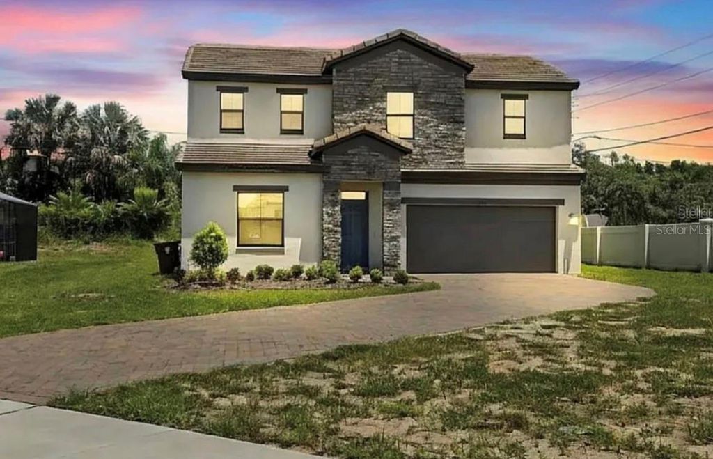 Photo of 233 Macaulay S Cove, Haines City, FL 33844 (MLS # O6338383)