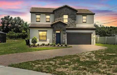 Photo of 233 Macaulay S Cove, Haines City, FL 33844 (MLS # O6338383)