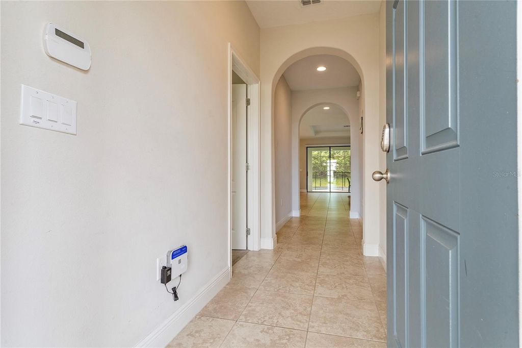 Photo of 233 Macaulay S Cove, Haines City, FL 33844 (MLS # O6338383)