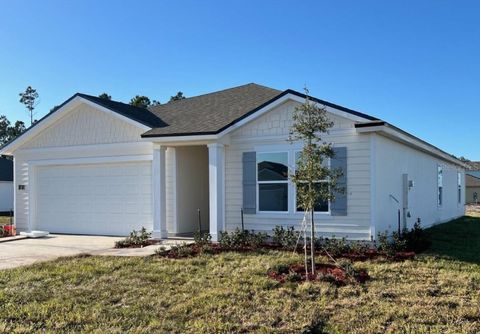 Photo of 2 Golden Oak Way, Palm Coast, FL 32137 (MLS # FC314502)