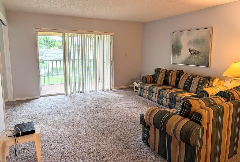 Photo of 8765 Bardmoor Boulevard #207, Seminole, FL 33777 (MLS # TB8556922)