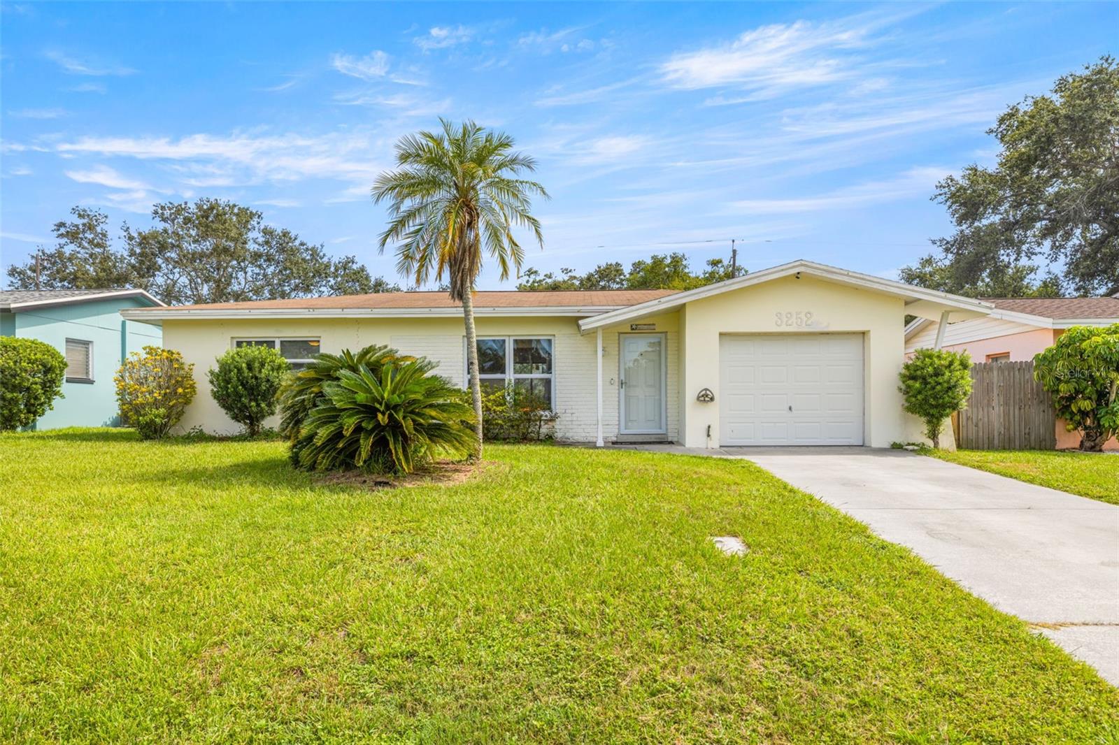 Welcome to this charming and affordable home tucked away in a quiet, well-established neighborhood. With no flood insurance required and no HOA fees, it’s the perfect blend of peace of mind and low-maintenance living. Zoned for the highly rated Anona Elementary School, this home is a fantastic choice as a first time home buyer or as a smart rental investment. Inside, fresh paint and easy-to-maintain tile flooring flow throughout the space. The living room and dining area connect seamlessly, with the dining space set conveniently off the kitchen. The kitchen itself is a standout, showcasing granite countertops, stainless steel appliances, and a modern backsplash that ties it all together beautifully. With two generously sized bedrooms, each with ceiling fans, and an updated bathroom featuring a newer vanity and a tub/shower combo, the home is both comfortable and practical. Enjoy the added convenience of the washer and dryer included. Step outside to the spacious, fenced backyard—perfect for pets, a firepit, or even a playset. A large, new shed provides extra storage for tools, toys, or hobbies. Peace of mind comes with the many updates, including a new AC unit, copper plumbing throughout, and all windows replaced in 2012. Ideally located, you’ll enjoy quick access to Largo’s many amenities. Spend a day exploring the Florida Botanical Gardens, Largo Central Park, or Heritage Village, or head less than 10 minutes west to the Gulf Coast’s world-famous beaches, including Indian Rocks Beach. Outdoor enthusiasts will also appreciate nearby Walsingham Park with its 100-acre lake, miles of trails, playground, and fitness area. Golf lovers can tee off at the nearby Largo Golf Course. Whether you’re looking for your primary home in the desirable Anona Elementary district or a fantastic rental opportunity, this property is full of potential.