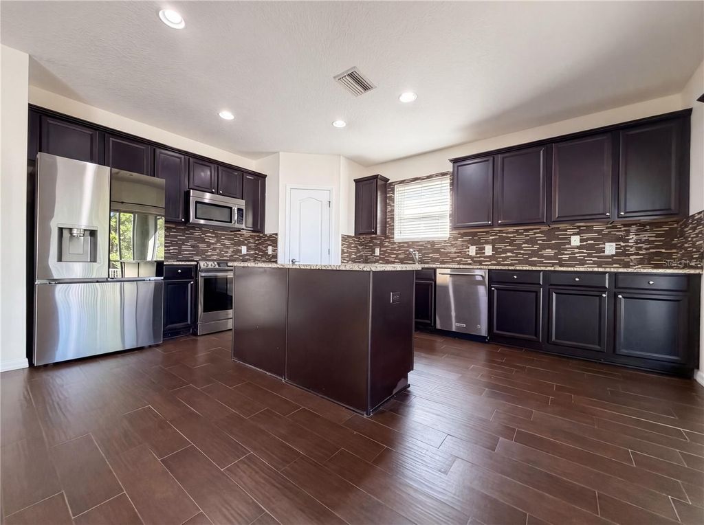 Photo of 12437 Field Point Way, Spring Hill, FL 34610 (MLS # O6400075)