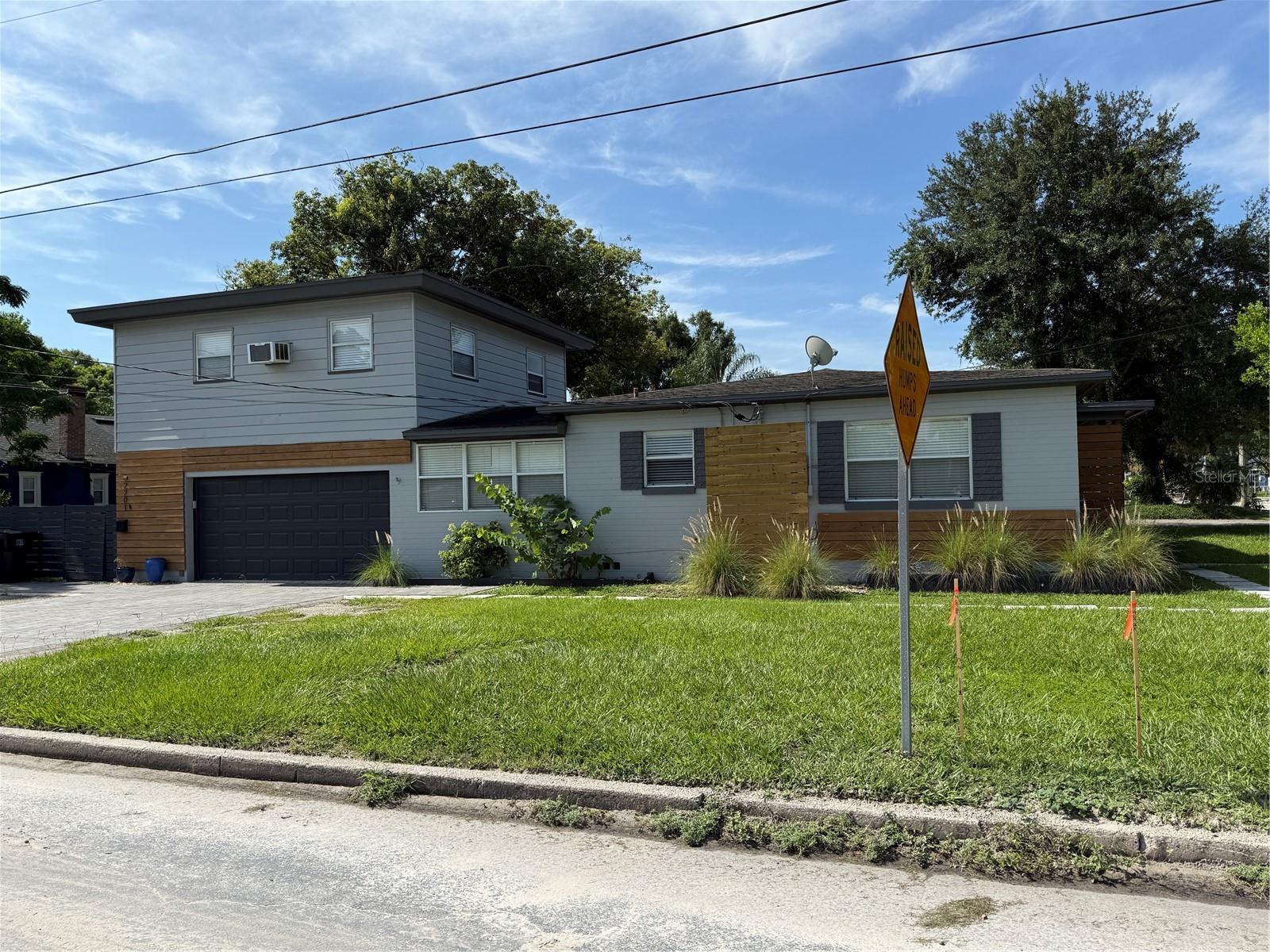 Located in the desirable neighborhood of Delaney, this beautifully updated 3-bedroom, 2-bath home offers a perfect blend of modern design and classic character. The kitchen shines with stainless steel appliances, new cabinetry, updated countertops, eye-catching tile backsplash, and stylish flooring. Down the hall, all three bedrooms feature original hardwood floors and contemporary ceiling fans for year-round comfort. Both bathrooms have been fully renovated with sleek, modern finishes. Additional features include an attached garage with a washer and dryer, and a fully fenced backyard with a large, covered deck—ideal for relaxing, entertaining, or soaking up Florida’s sunshine. Yard maintenance is included and handled by the owner for added ease. This home is located within the highly desirable Blankner K-8 and Boone High School district—just a short walk to Boone—and offers quick access to SoDo, Delaney Park, Colonialtown South, the Milk District, Hourglass District, ORMC, MCO Airport, I-4, 408, and a wide array of shopping and dining options.
