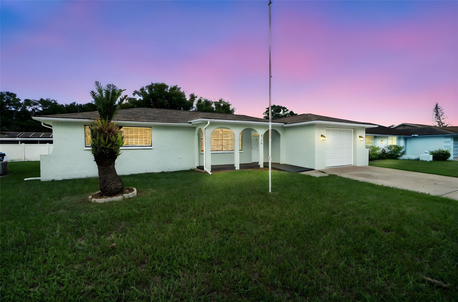 Welcome to the completely move-in ready 3-bedroom, 2-bath home with an open floor plan and stylish updates throughout. This home will not last!
Offering peace of mind with a new roof (2023), new AC, insulation, and ductwork (2022), and a new water heater (2025). The fully remodeled kitchen (2023) features Whirlpool stainless steel appliances, modern cabinetry, and durable vinyl plank flooring that continues throughout the home. Both bathrooms have been updated, including a complete remodel of the primary bath in 2023 with new tile surround, vanity, flooring, and toilet, plus a second bath with a new vanity and lighting.
Enjoy indoor-outdoor living in the recently re-screened Florida room (2022), accessible from both the living/dining area and the primary bedroom. A step-free entry with a new weather-resistant front porch deck and a 1-car garage add even more convenience.
Perfectly located near shopping, dining, medical facilities, and just a short drive to Gulf beaches and downtown New Port Richey, this home combines modern upgrades, low-maintenance living, and everyday convenience.
This home is truly turn-key and move-in ready.