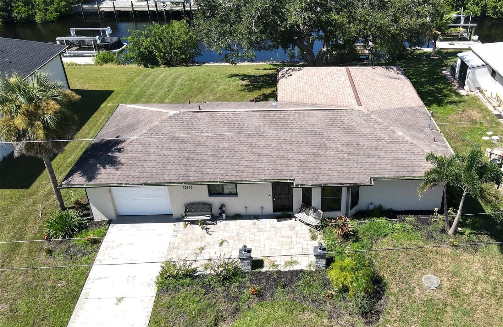 **PLEASE ENJOY THE 3D INTERACTIVE VIRTUAL TOUR ASSOCIATED WITH THIS LISTING! Looking for a SAILBOAT water home with a dock? Look no further! This quaint 2 Bedroom, 2 Bath home with an oversized lanai awaits its new owner! Many updates have been added to this split bedroom residence... Impact windows and new dock were installed in 2020 along with updated cabinets and Granite countertops. The roof was updated in 2016. The large lanai (22x20) is fully screened and includes brick pavers making this area a great place for entertaining. Conveniently located in the heart of Port Charlotte, this home is less than 10 miles to downtown Punta Gorda where you can enjoy many restaurants & shopping. Call today for your private showing of this great home!