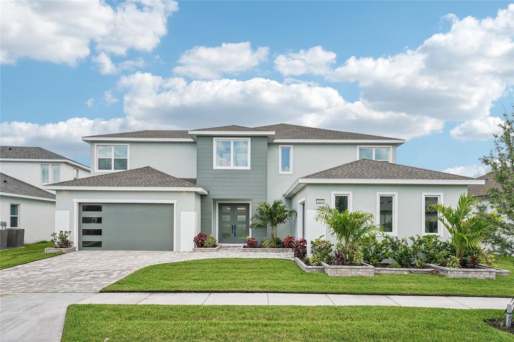 Photo of 9201 Sanders Tree Loop, Wesley Chapel, FL 33545 (MLS # O6317926)