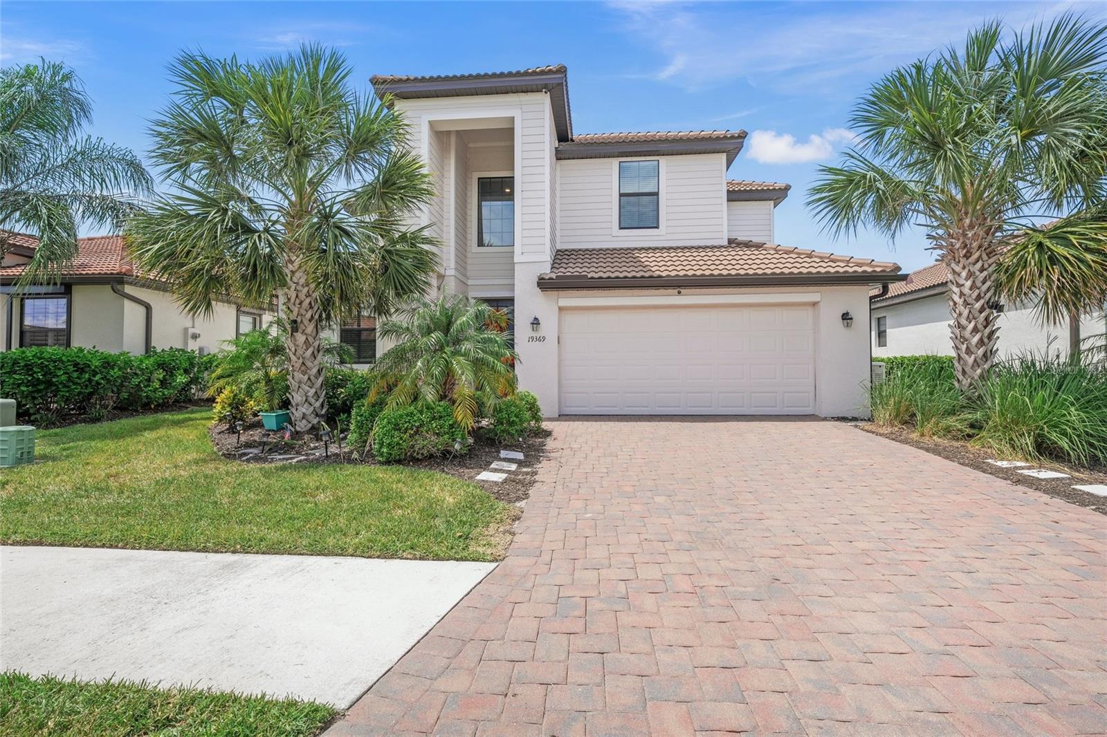 One or more photo(s) has been virtually staged. Experience the epitome of comfort and best Florida living in this stunning 5-bedroom, 3-bathroom plus bonus room home located in the sought-after Watercrest community. With over 3,400 sq. ft. of meticulously designed living space, this residence offers a seamless blend of sophistication and functionality. Enjoy the convenience of a GENERAC whole house generator (2022), hurricane shutters, cost efficient Solar panel system and outdoor security system. Step through the cathedral-like foyer and be greeted by soaring high ceilings and exquisite crown molding that set the tone for this inviting home. The open floor plan enhances the airy ambiance, making it perfect for both relaxation and entertaining. The formal living and dining areas are ideal for hosting gatherings, while the open-concept kitchen features a large island, perfect for casual dining and family get-togethers. Step outside to your private oasis—complete with a Saltwater pool with waterfall, beach entry, and hot tub (2022), and pond view. This outdoor paradise is perfect for unwinding or entertaining in style. The main level also features a bedroom with a full bathroom, ideal for guests. The second floor boasts a spacious loft and a bonus room, offering endless possibilities as a game room, playroom, or home office. The master suite is a true retreat, featuring two walk-in closets, a large soaking tub, a separate shower, and dual sinks. The upper level includes three more generously sized bedrooms and a full bath with dual sinks and a shower/tub combo, providing ample space for family and guests. The unique 3-car garage with multi split and epoxy flooring provides plenty of space for vehicles, bikes, canoes, and kayaks, while additional storage solutions are available throughout the home. The laundry room is conveniently located on the main living level for added ease. Maintenance-free living with low HOA fees and no CDD fees. The gated community of Watercrest offers a large zero entry heated pool with cabana, state of the art fitness center, bocce ball court and lots of activities for the whole family. Watercrest is centrally located near access to I-75, grocery stores, medical offices and the new Sarasota Memorial Hospital. Approximately 4 miles to downtown Venice with endless shopping and dining options and gulf beaches. Don't miss this opportunity to own a beautiful home in Watercrest, where every detail has been carefully considered to enhance your lifestyle. Schedule your showing today and discover your new home! See list of Features and Upgrades.
