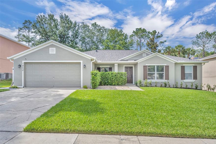 Welcome home to this beautifully maintained 4-bedroom, 2-bath POOL home offering 2,119 sq. ft. in the desirable Skyridge Valley community of Clermont! Designed with both comfort and functionality in mind, this home features a spacious, open-concept layout with seamless flow between the main living areas. The inviting living room is highlighted by a charming fireplace, creating a warm and welcoming focal point. The updated kitchen is a true standout, showcasing granite countertops, stainless steel appliances, a breakfast bar, pendant lighting, and a cozy breakfast nook—perfect for everyday living and entertaining. A separate formal dining room adds versatility and features a stylish shiplap accent wall. Tile throughout the main living areas makes maintenance quick and effortless. The generously sized primary suite offers a relaxing retreat with an en suite bath complete with a double vanity, an oversized walk-in shower, and a large walk-in closet. The additional bedrooms are all comfortably sized and ideal for guests or a home office. Step outside to your own private backyard oasis featuring a screened lanai, paver patio, and a fully fenced yard with a new gate and no rear neighbors. Enjoy sunny Florida days splashing into the pool and unwinding in your own outdoor retreat. Additional highlights include a newer roof (2023), new sod, and a 2-car garage with epoxy flooring and an EV charger. This home has been meticulously cared for and offers fantastic curb appeal. Ideally located near top-rated schools, shopping, dining, the Turnpike, and medical facilities, this home truly has it all. Schedule your private showing today!