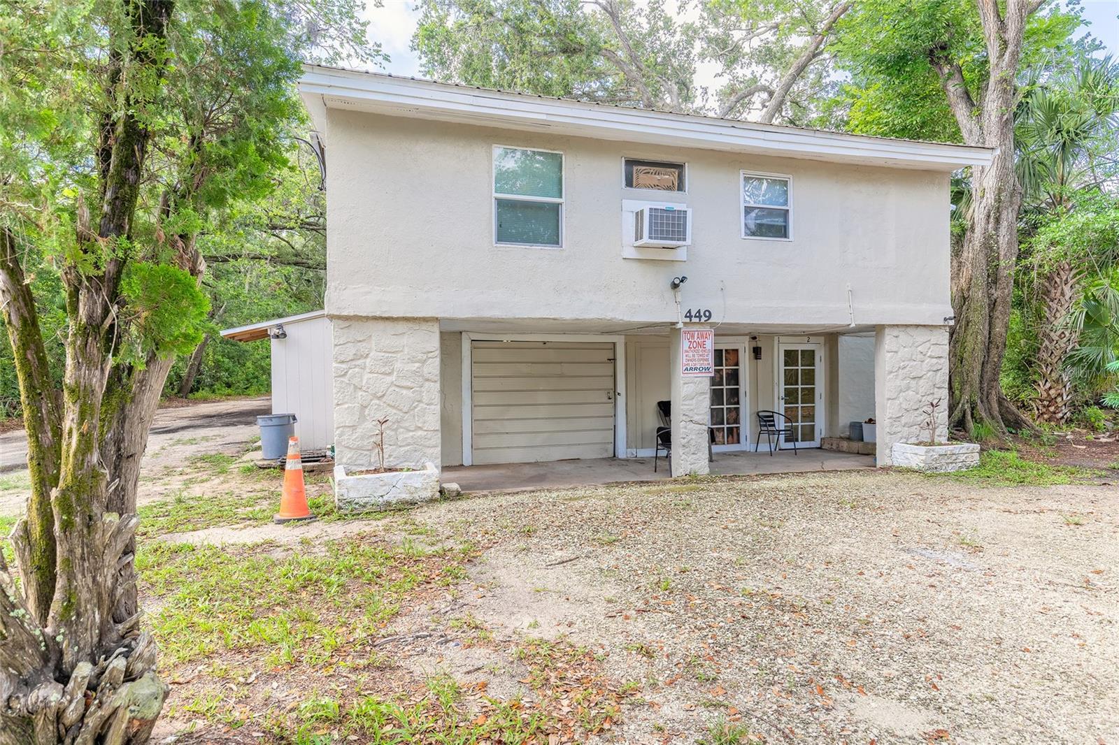 Welcome to this unique investment opportunity in the heart of Daytona Beach! Situated on a spacious 0.8-acre lot, this income-generating quadruplex features two separate buildings with tenants already in place, offering immediate cash flow for savvy investors. The main building is a two-story structure configured into three individual units. Upstairs, you'll find two spacious two-bedroom, one-bathroom apartments. The ground floor unit offers a one-bedroom, one-bathroom layout. In addition to the main building, the property has a standalone single-family home, featuring three bedrooms and two full bathrooms. Located just minutes away from the world-famous Daytona International Speedway, the scenic Halifax River, pristine beaches, and all the vibrant entertainment, dining, and shopping that Daytona Beach has to offer. Don't miss your chance to own this rare investment property with significant potential for future growth and excellent returns. All information deemed accurate but cannot be guaranteed. Roof for both buildings 2023, main building hot water heater 2023, back house 2003 hot water heater.
Unit 1 (located upstairs) 2/1 $1,200 monthly tenant is month to month
Unit 2 (located upstairs) 2/1 $1,300 monthly expires 02/28/2026
Unit 3 (located downstairs) 1/1 $1,100 monthly expires 02/28/2026
Unit 4 (single family home) 3/2 1,700 monthly expires 11/30/2025