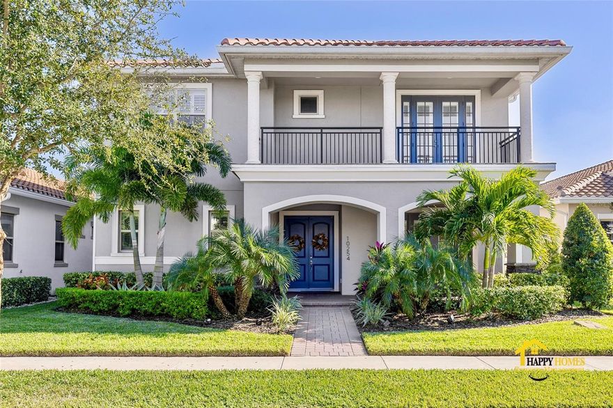 Experience refined living in this impressive five bedroom residence set behind the guard gated entrance of Eagle Creek. At 4211 square feet, the home is filled with natural light and elevated finishes that create a warm and polished atmosphere from the moment you step inside. The main living area offers beautiful indoor and outdoor flow through wide sliding glass doors that open to a tranquil covered patio with an additional electric fireplace and custom planters. Lush landscaping and a fully fenced yard create a private setting that feels like an outdoor retreat.
The kitchen brings together beauty and function with dual islands, quartz countertops, white cabinetry, stainless steel appliances, and generous workspace for both daily meals and effortless entertaining. The first floor includes a bedroom and full bath, ideal for guests or a comfortable home office setup. Upstairs, the home continues to impress with a spacious loft, a large bonus room, and a well appointed laundry room with cabinetry, quartz counters, and a utility sink.
The primary suite offers a peaceful escape with French doors that open to a second story covered porch, along with a spa inspired bath featuring a frameless shower and elevated finishes. Every detail has been thoughtfully selected to enhance comfort and style. Located only moments from the community pool, playground, and scenic ponds, this home offers exceptional living in one of Lake Nona’s most desirable neighborhoods. This home is pet friendly, cats and small dogs considered.