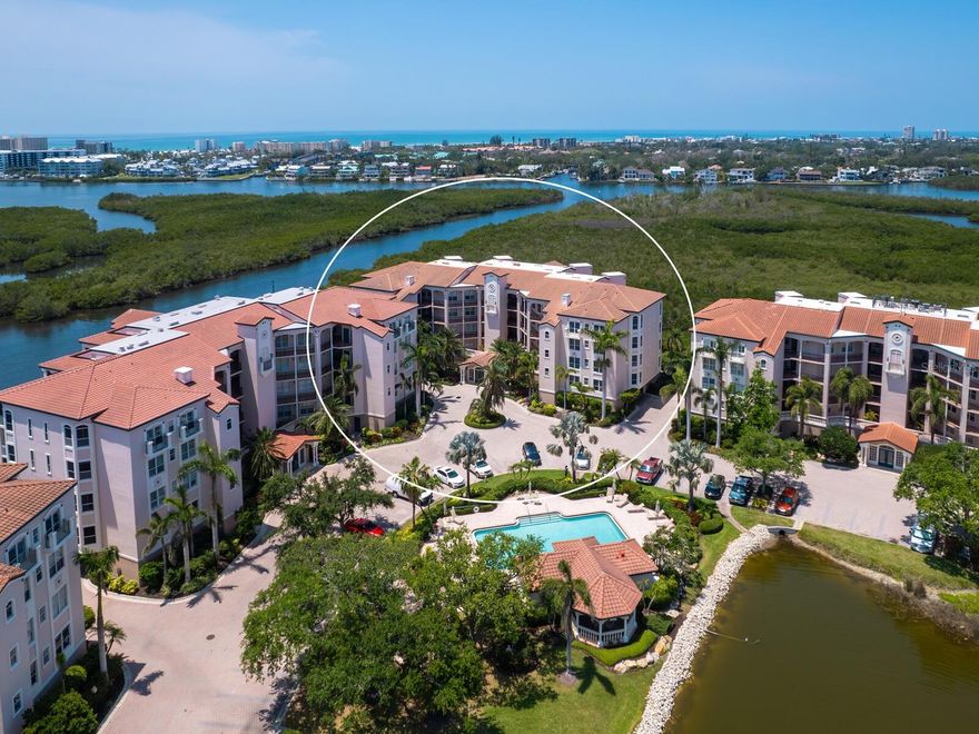 Simply the best Eagles Point location- it is all about the light and the view.  Every room in this 3 bed, 2 bath condo enjoys a water view.  This corner condo boasts both a southern exposure overlooking Phillippi Creek and western exposure of the Intracoastal Waterway and Siesta Key. You will easily pass your time and be captivated watching fish jump, birds dive, and boaters go by. This condo is positioned for privacy- you do not look into any nearby buildings. Reflect on your day watching the sunset- moments of pure awe with such stunning colors.  The first floor condos are unique with an expanded open terrace. A portion of this terrace has been screened for added enjoyment. A rare feature for an Eagles Point condo is a second under building car spot- no need to leave your second vehicle outside in the elements. HVAC, Hot Water Tank, Washer & Dryer are  new.  Hurricane shutters on western facing windows The Landings is a gated community known for its well-maintained grounds, nature trail to the ICW, and desirable amenities. Eagles Point residences have their own pool and barbecue area nearby as well as membership to the Landings Racquet Club which offers a fitness center, eight har-tru tennis courts, pickle ball, pool with spa, and numerous social activities. Kayak storage with launch area for easy access to the waterway is yet another feature. Take a look- easy to show.
