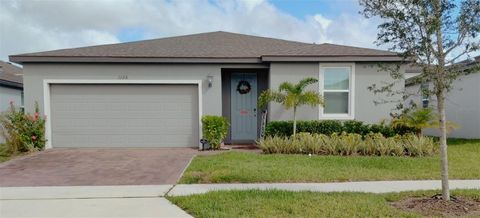 Photo of 1126 Foreshore Lane, Haines City, FL 33844 (MLS # O6355271)