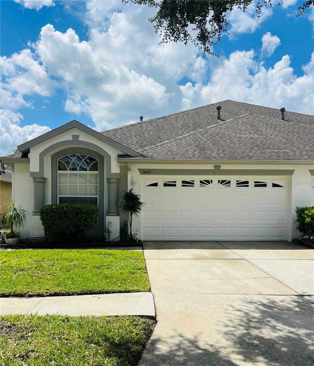 Beautifully maintained villa in sought after gated community of Oakstead boasting resort style amenities like a clubhouse, pool, fitness center, tennis courts, basketball courts, playground, and pickle ball courts. 2 spacious bedrooms, 2 full bathrooms, French doored Den, and a 2 car garage. Large primary bedroom with a walk in closet and ensuite with double vanities and tiled walk in shower. Open great room plan leading to the screened, covered lanai, and fenced in yard. Close to shopping, restaurants, the interstate and expressway.