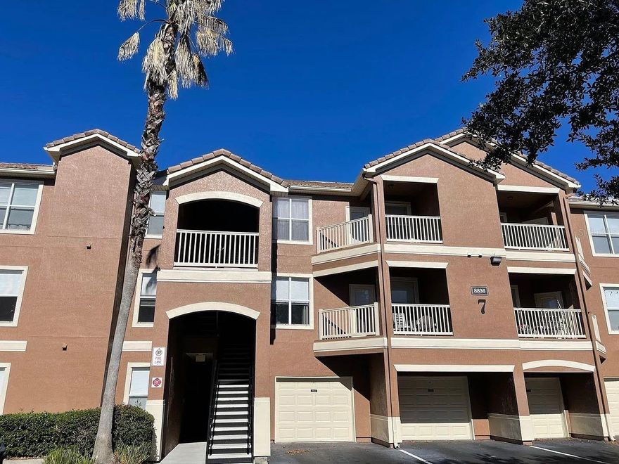 Beautiful condo for rent in one of the best locations in Orlando. Enjoy comfortable living in this well-maintained property strategically located just minutes from Walt Disney World, International Drive, Premium Outlets, restaurants, shopping centers, and with quick access to major Orlando highways. Perfect for professionals, couples, or small families seeking security, comfort, and an excellent location. This condo features a functional open layout with abundant natural light, creating a warm and inviting atmosphere. The kitchen flows seamlessly into the living and dining areas, providing a practical and modern space for everyday living. A spacious balcony offers the perfect place to relax after work or enjoy your morning coffee. The bedrooms are generously sized with an excellent layout that ensures privacy and comfort, and the bathrooms are designed for both functionality and convenience. The property includes easy, convenient parking where you can simply arrive and park, and WiFi is included in the rent. Community amenities include a resort-style swimming pool, fully equipped fitness center, clubhouse, gated entry, and beautifully maintained green areas