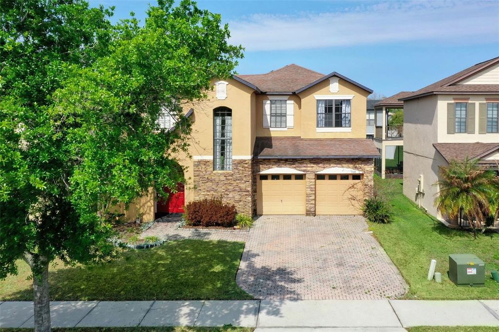 Photo of 9708 Old Patina Way, Orlando, FL 32832 (MLS # O6391022)