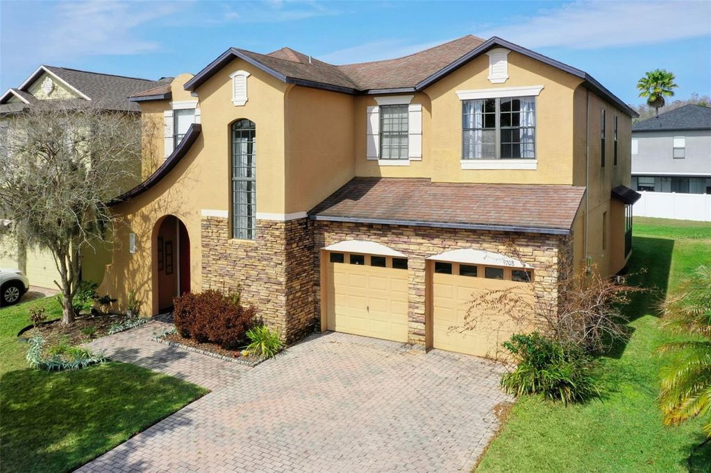 Photo of 9708 Old Patina Way, Orlando, FL 32832 (MLS # O6391022)