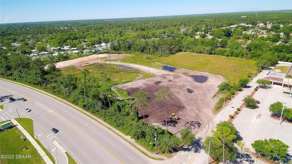 Photo of 3830 Clyde Morris Boulevard, Port Orange, FL 32129 (MLS # V4939511)