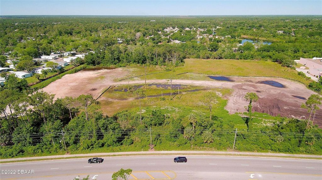 Photo of 3830 Clyde Morris Boulevard, Port Orange, FL 32129 (MLS # V4939511)