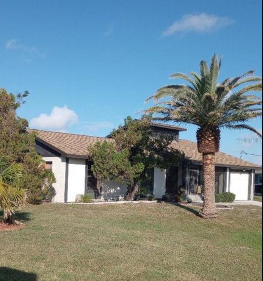 Photo of 20 Pebble Beach Road, Rotonda West, FL 33947 (MLS # D6144375)