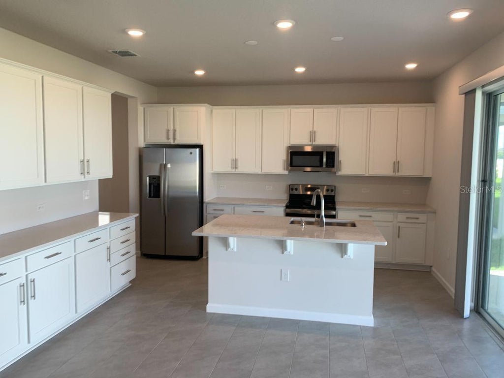Photo of 1064 Sugarwood Street, Davenport, FL 33837 (MLS # L4965037)